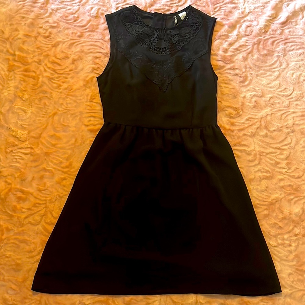 Black sleeveless zip up dress